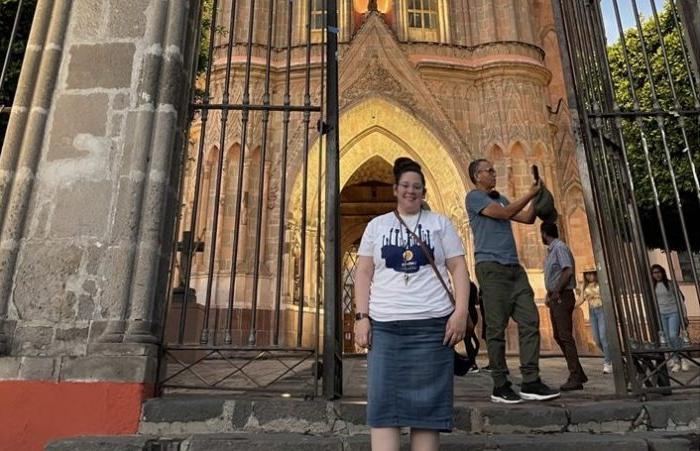 Charity in front of a church.